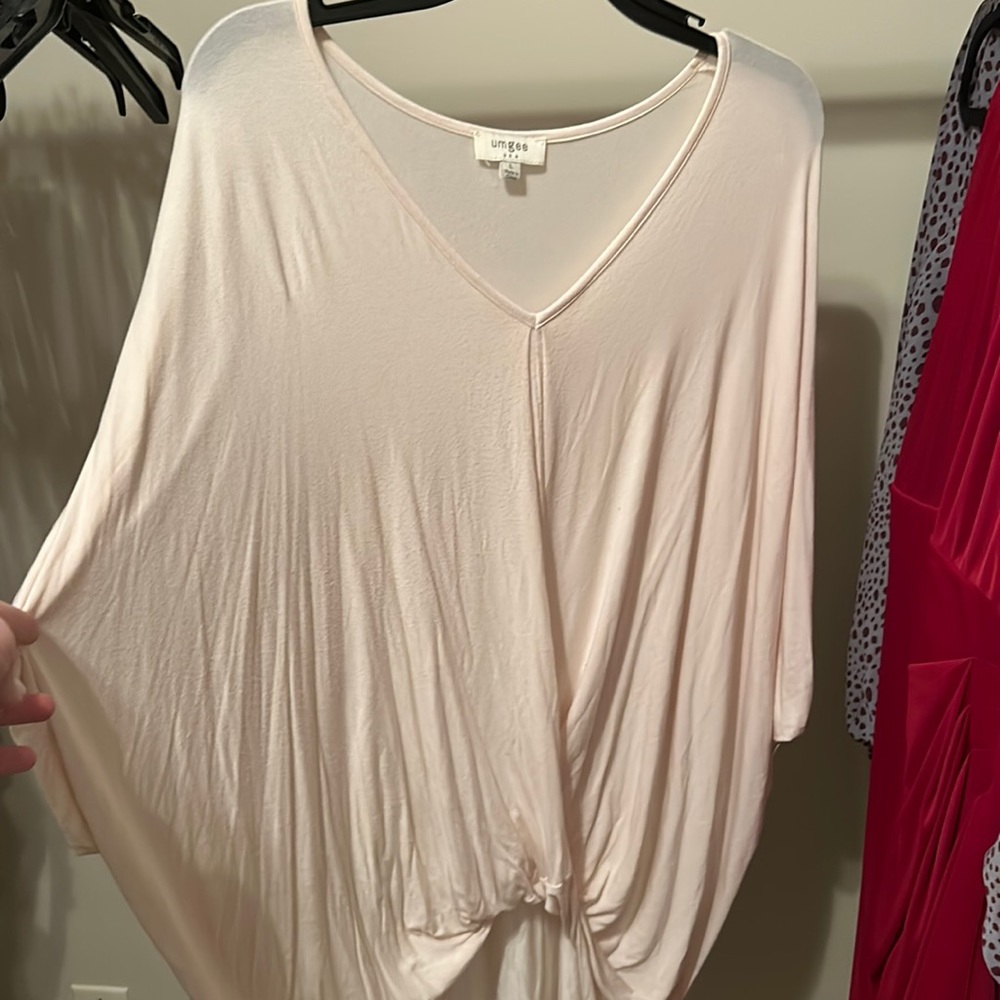 Size L cream tunic. Cute knot in front! Smoke free home!